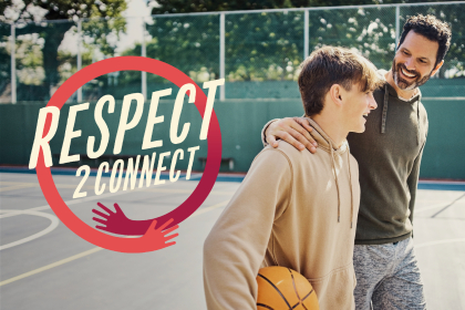 Two males on a court and one is holding a basketball. The Respect2Connect logo is to the left of the males.